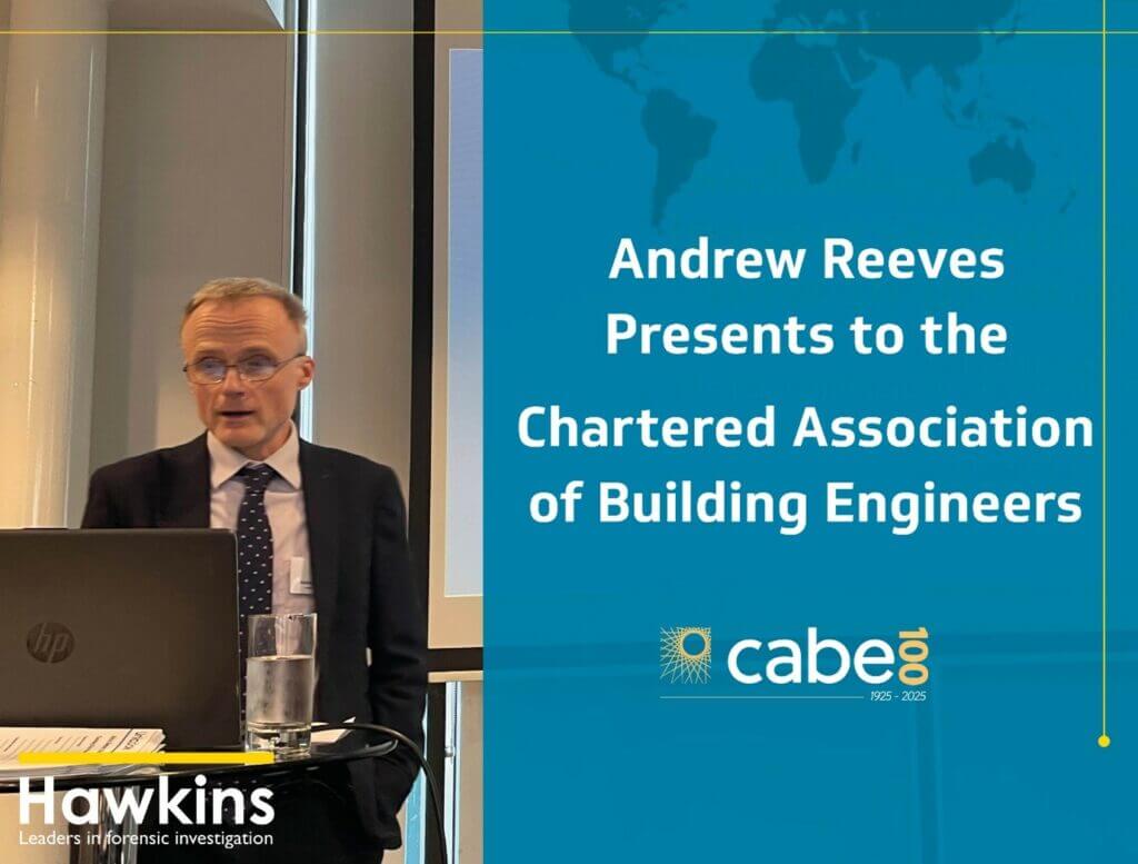 Image of marketing director and built environment expert Andrew Reeves behind a laptop, giving a presentation at the Chartered Association of Building Engineers