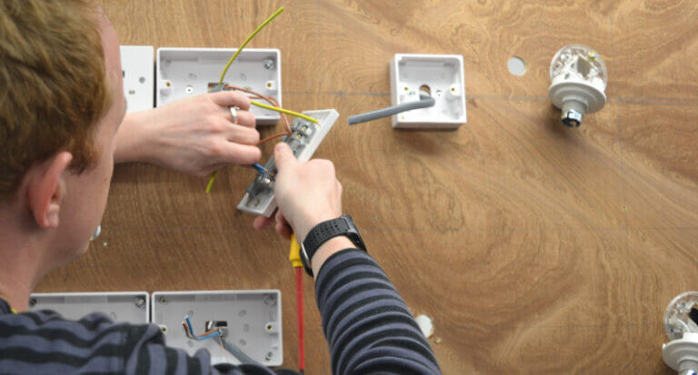 Hawkins investigator carrying out electrical training