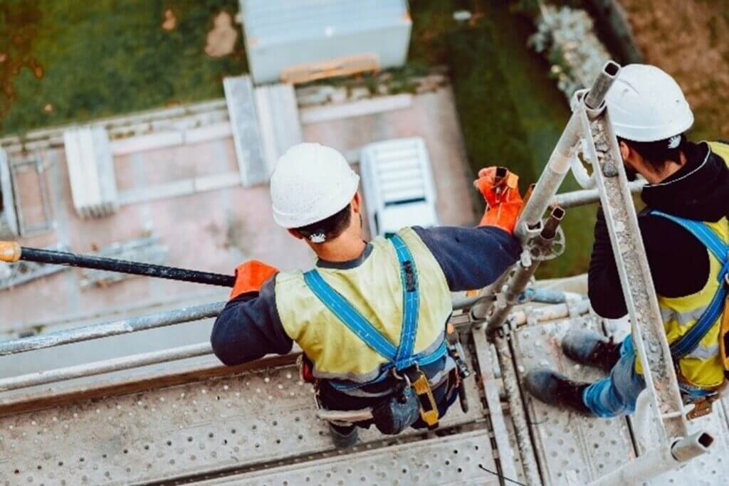 worker at height with harness