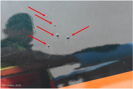 Elly's photograph showing the blistering of paint